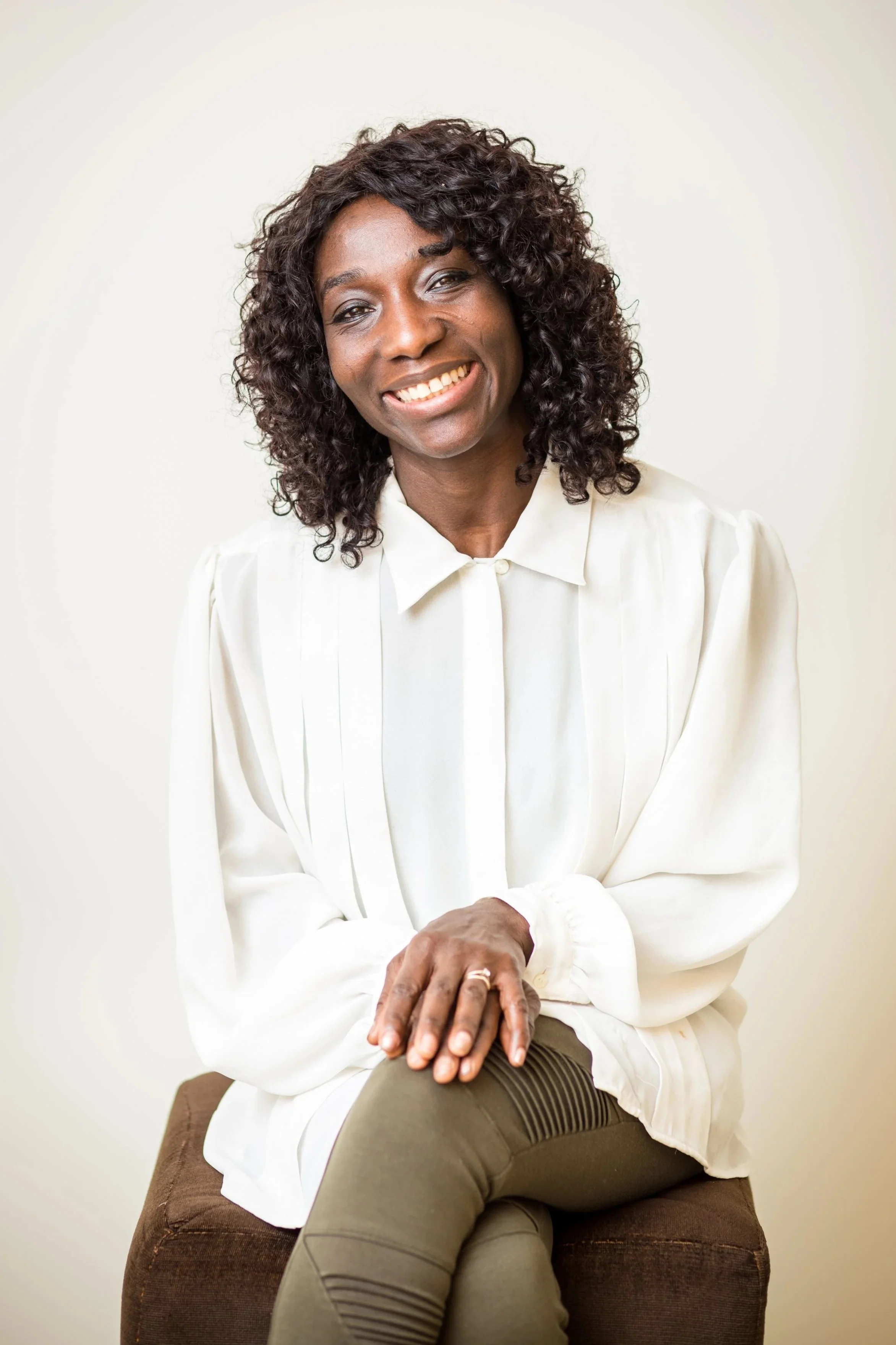 Jamila Gubbels, Registered Nurse and Death Doula, welcoming families to connect for end-of-life support.