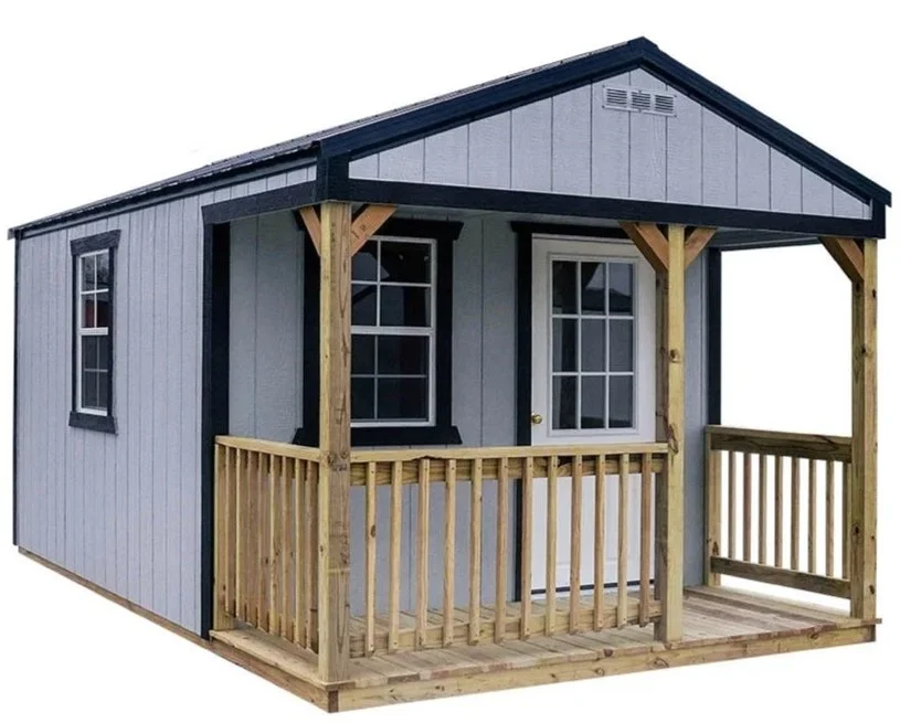 Small gray wooden playhouse with a porch, black trim, and two windows.