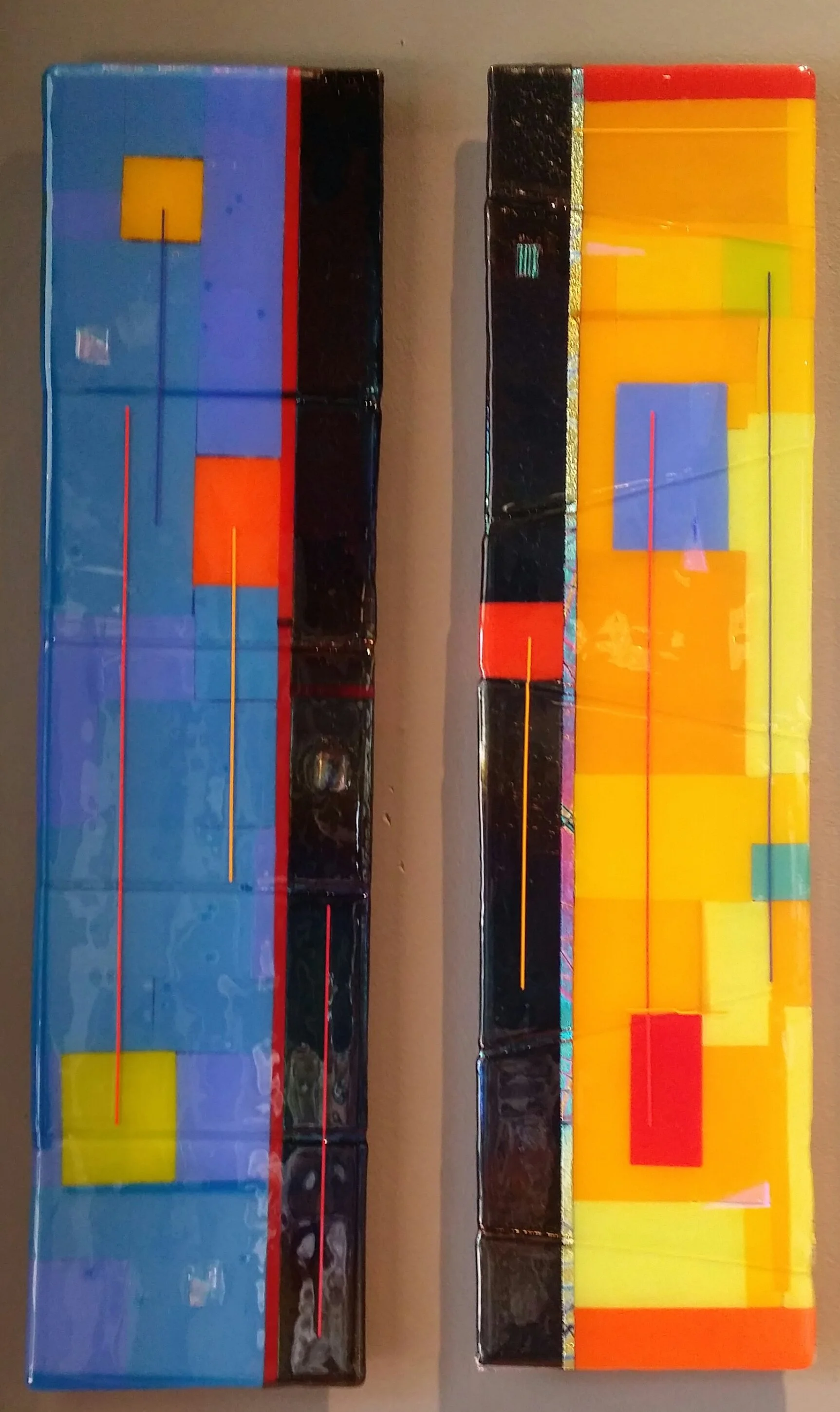 Yolanda Adra Designs.  Opalescent and dichroic fused glass.  Each panel: 32H x 6W.  