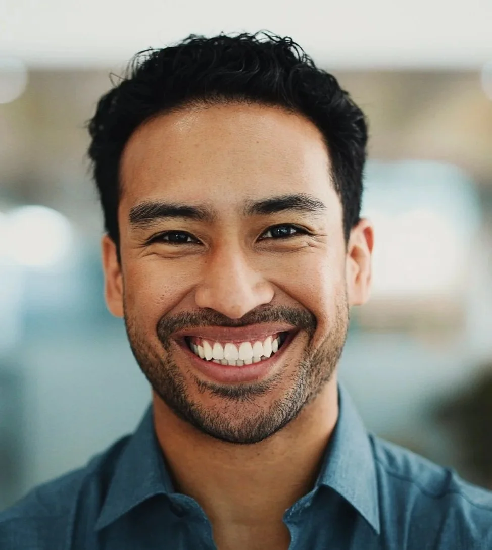 Young man smiling after a maintenance dentistry appointment at Accent Your Dentist in Ponsonby, Auckland, supporting long-term oral health and a healthy smile.