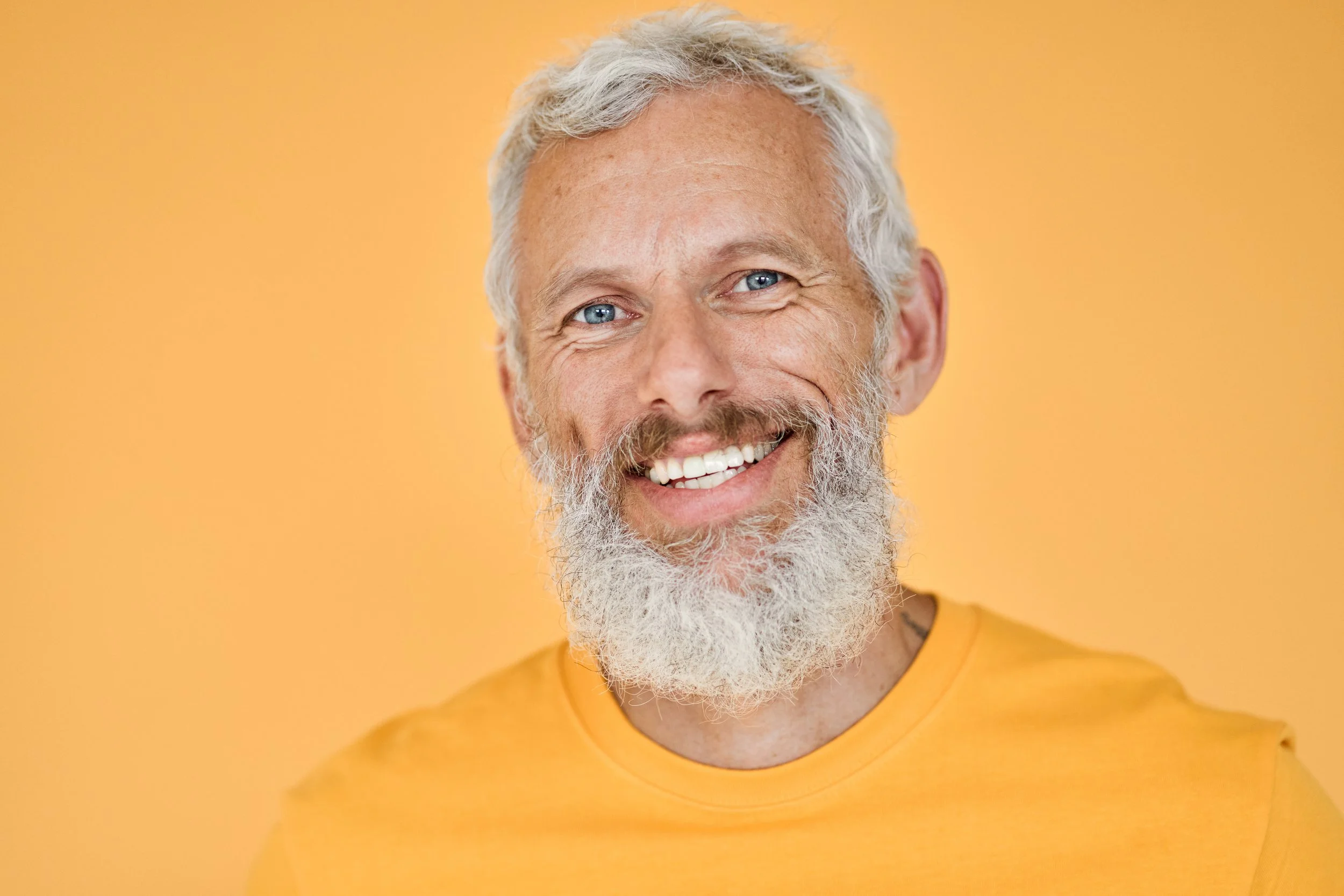 Male patient with yellow tshirt after restorative dentistry at Accent Dentists