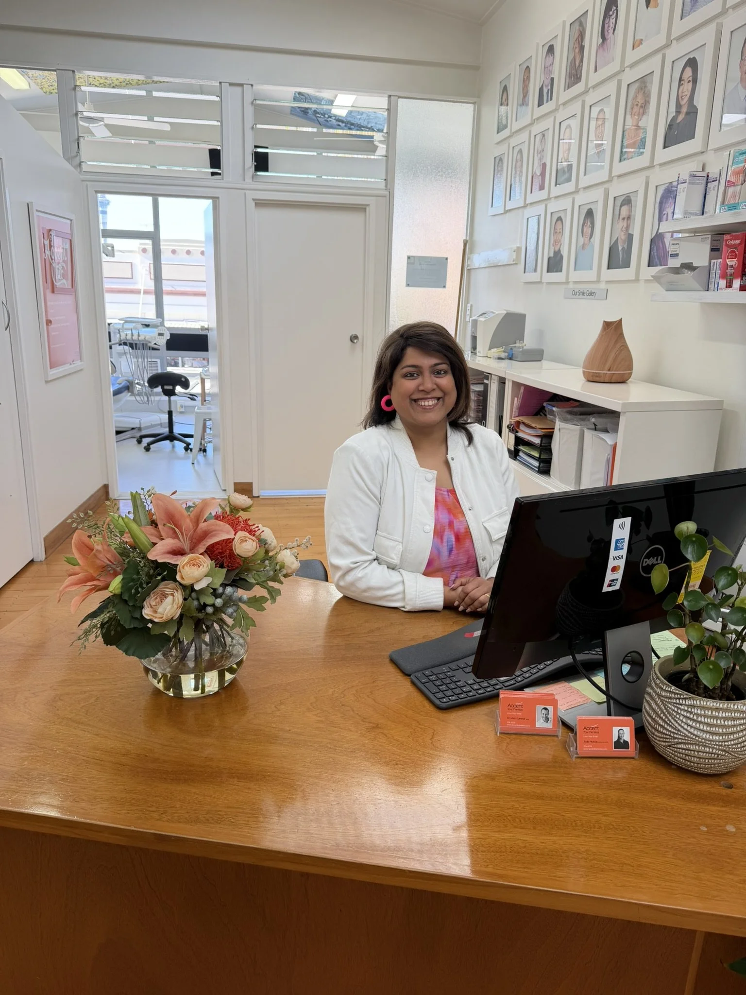 Karen Fernandes, receptionist at Accent Your Dentist in Ponsonby, Auckland, welcoming patients with friendly and professional service.