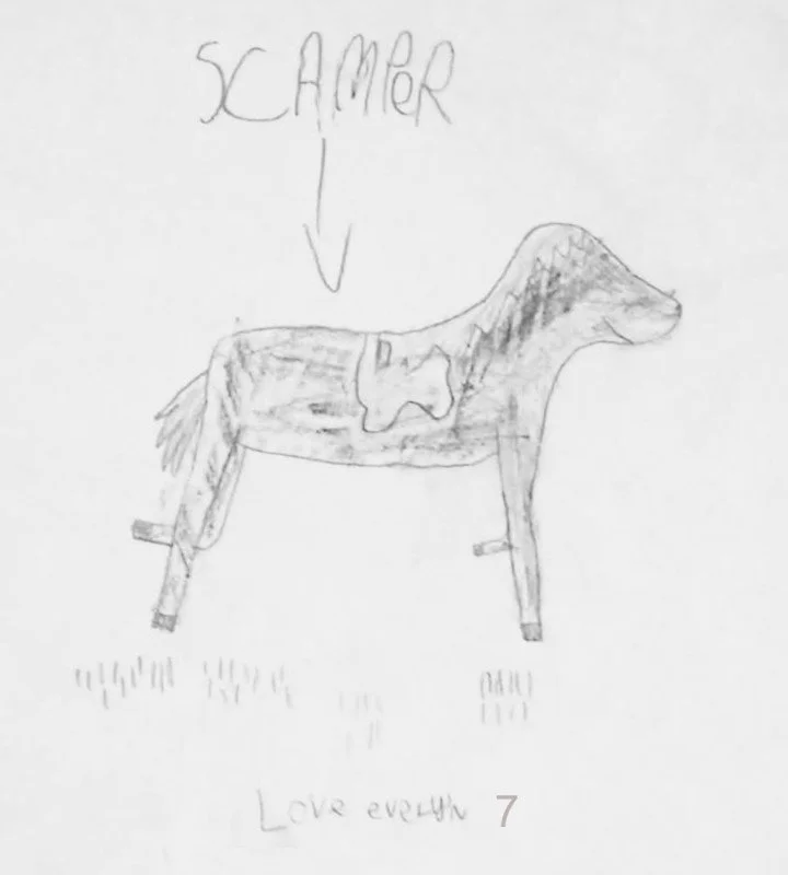 A child's sketch of a dog, labeled 'SCAWER' with an arrow pointing to it, and 'Love everyone 7' written underneath.