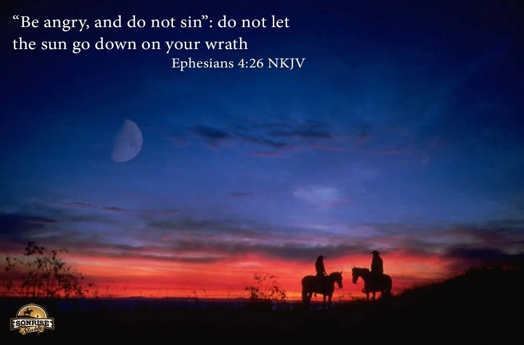 A sunset or twilight sky with a visible moon and clouds, featuring two people on horseback silhouetted against the colorful horizon, with a Bible verse from Ephesians 4:26 displayed.