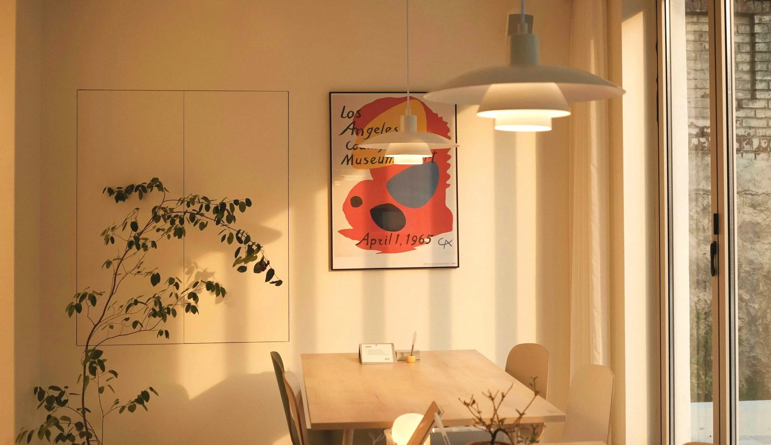 Cozy dining area in a Portland, Oregon home with a wooden table.