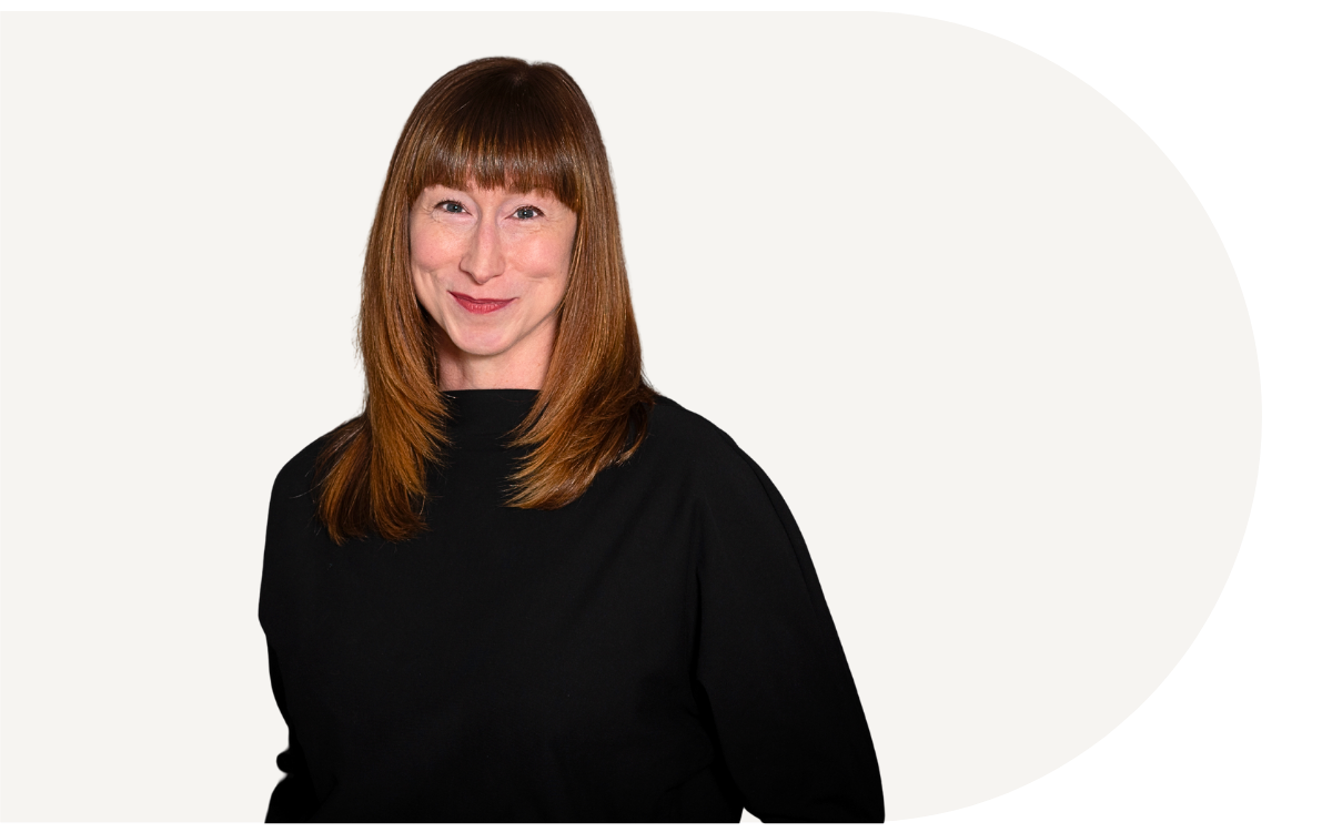 Photo of Lou Chain, Portland Oregon Realtor smiling against a plain light background.