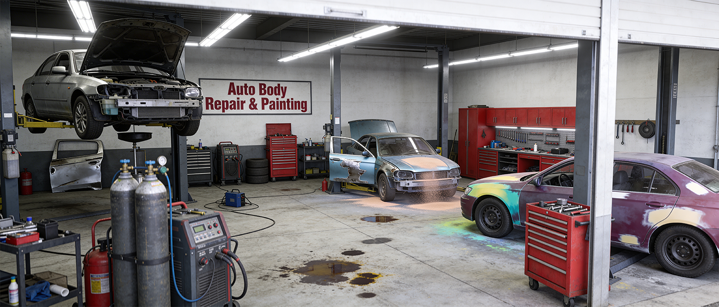 Interior of an auto body repair shop with three cars in various stages of repair, workbenches, and tools.