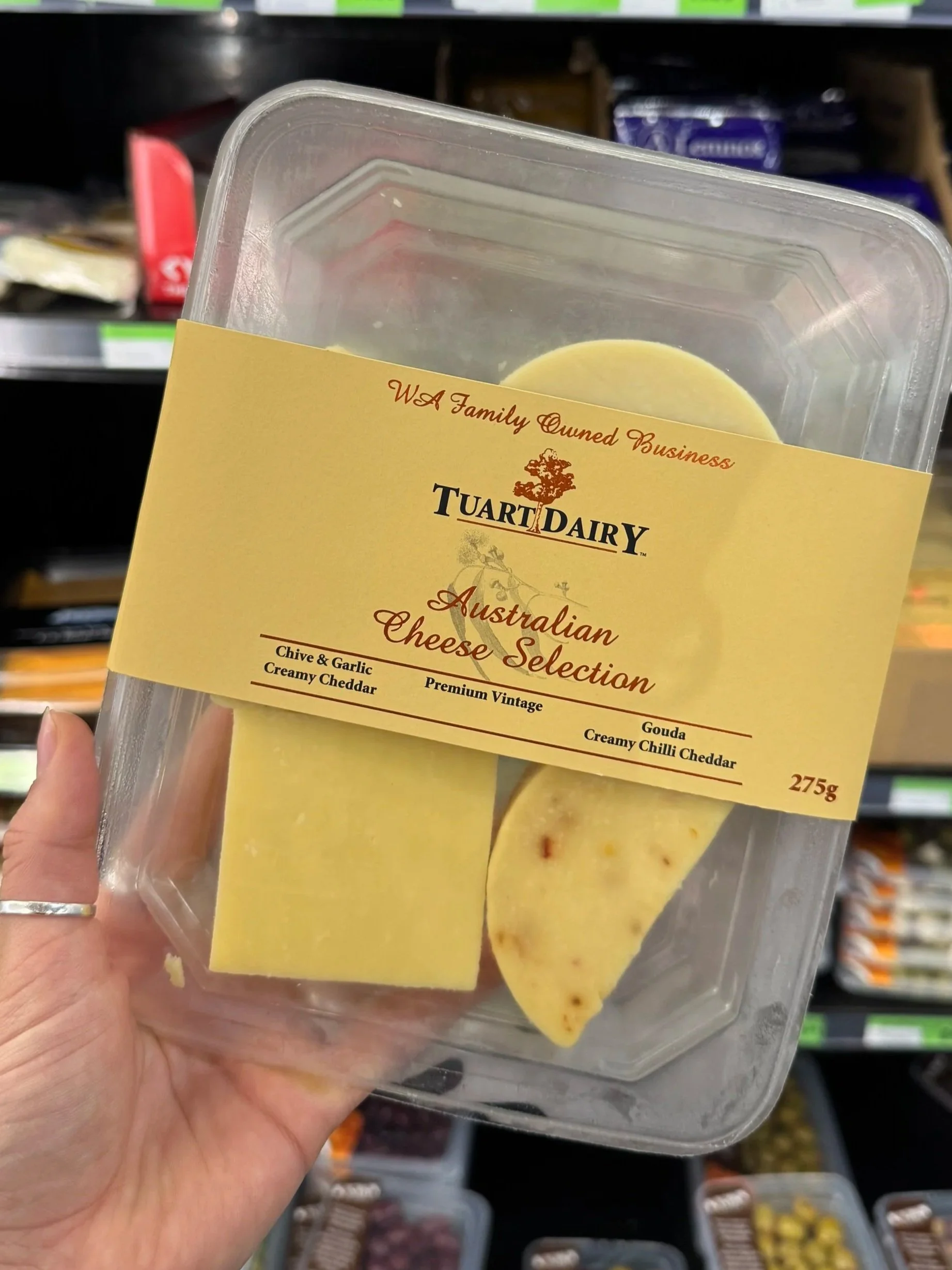 Fully stocked dairy fridge with local milk and everyday essentials