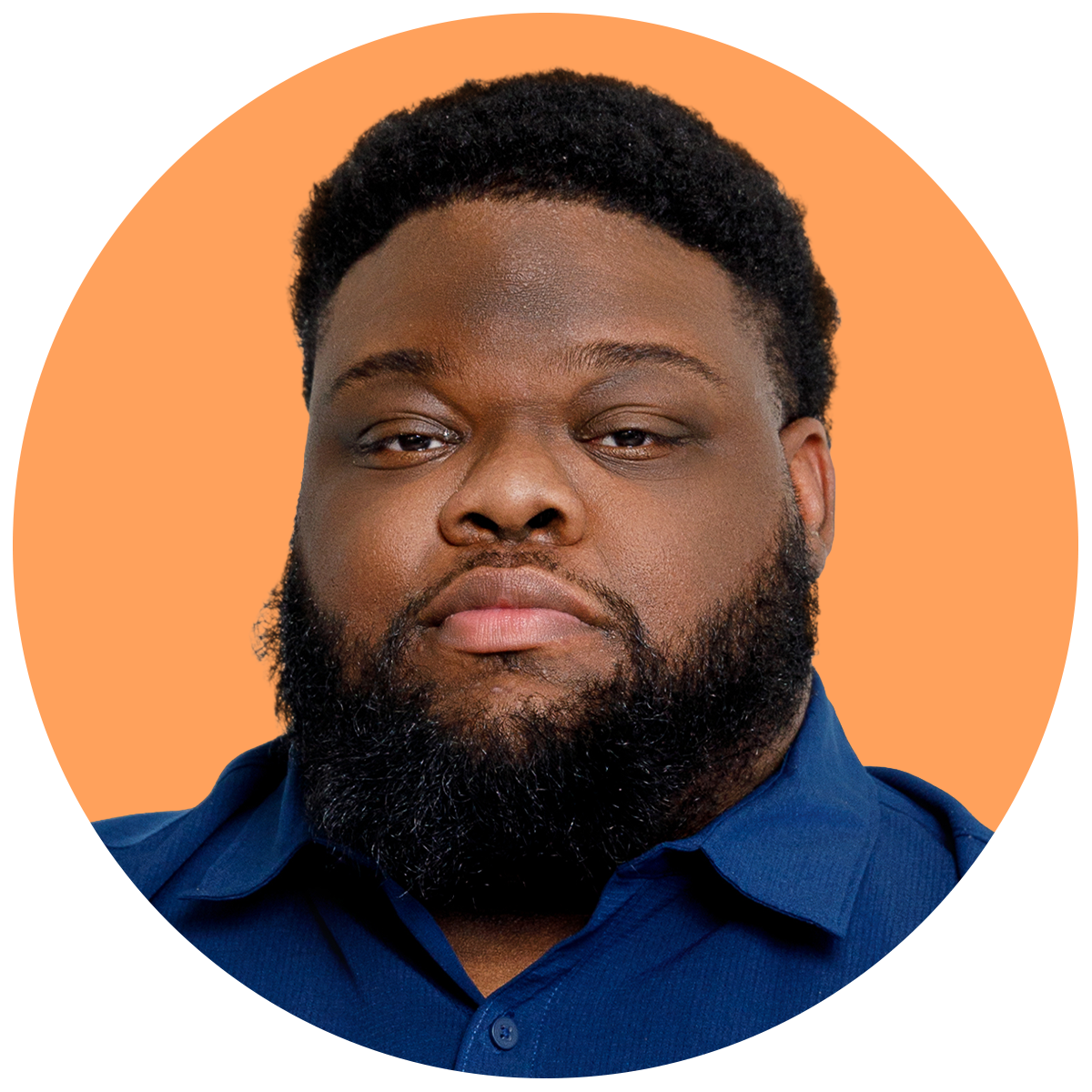Close-up portrait of a black man with a full beard and short curly hair, wearing a dark blue shirt, against an orange background.