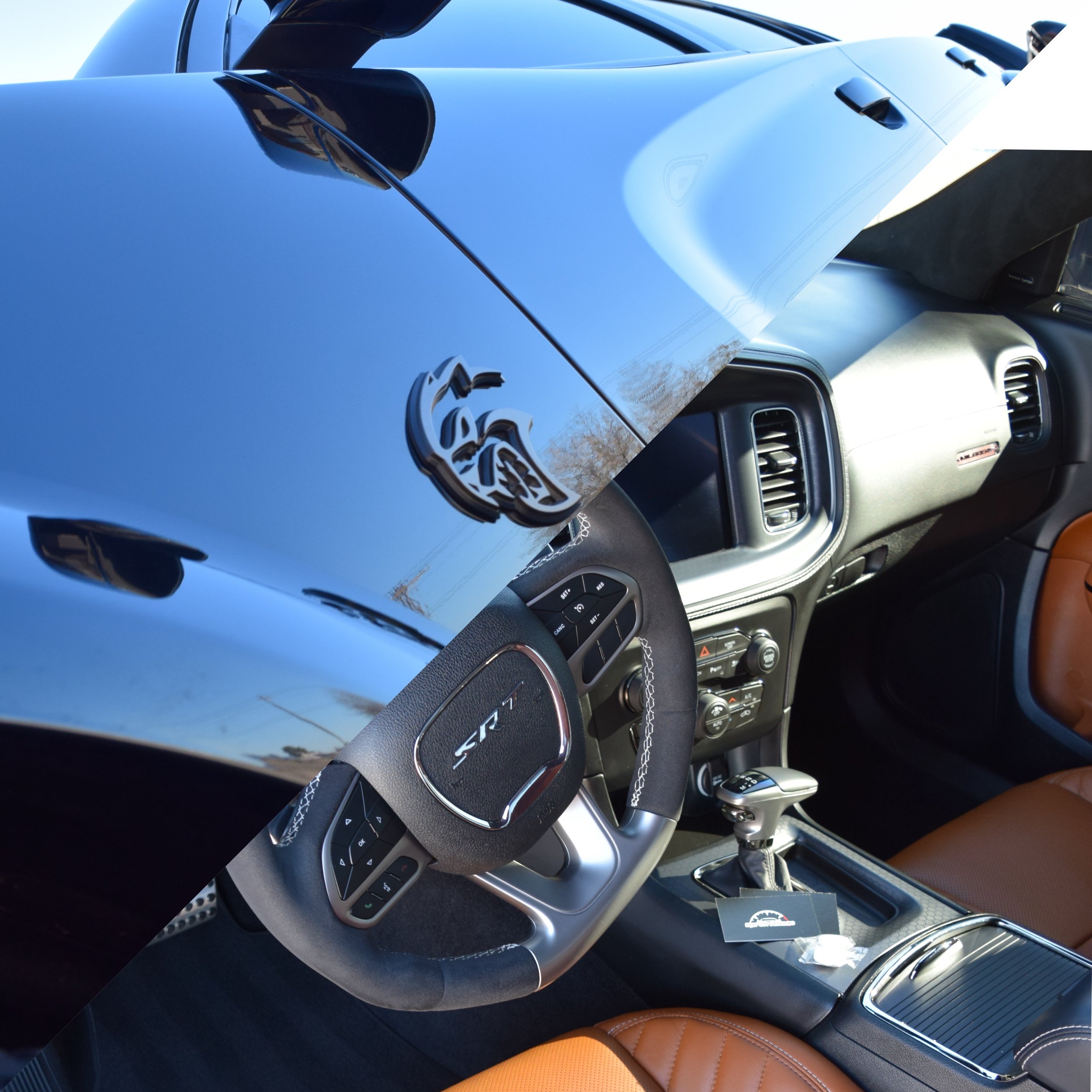 Interior of a vehicle with a black steering wheel, dashboard, gear shift, and orange seats, viewed from the passenger side.