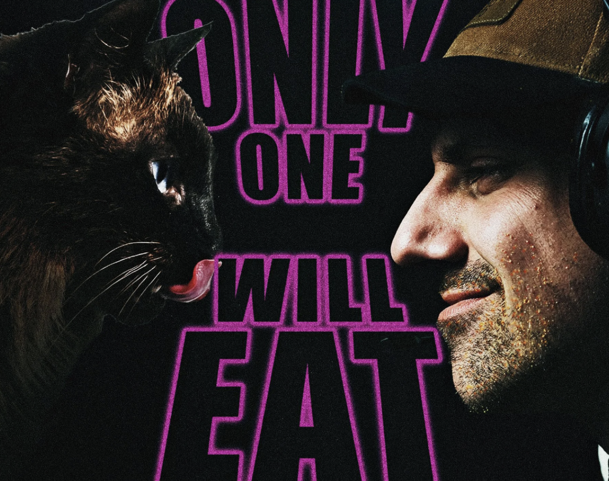 A person wearing a cap and headphones faces a black cat with glowing eyes in front of neon pink text that says "Only One Will Eat."