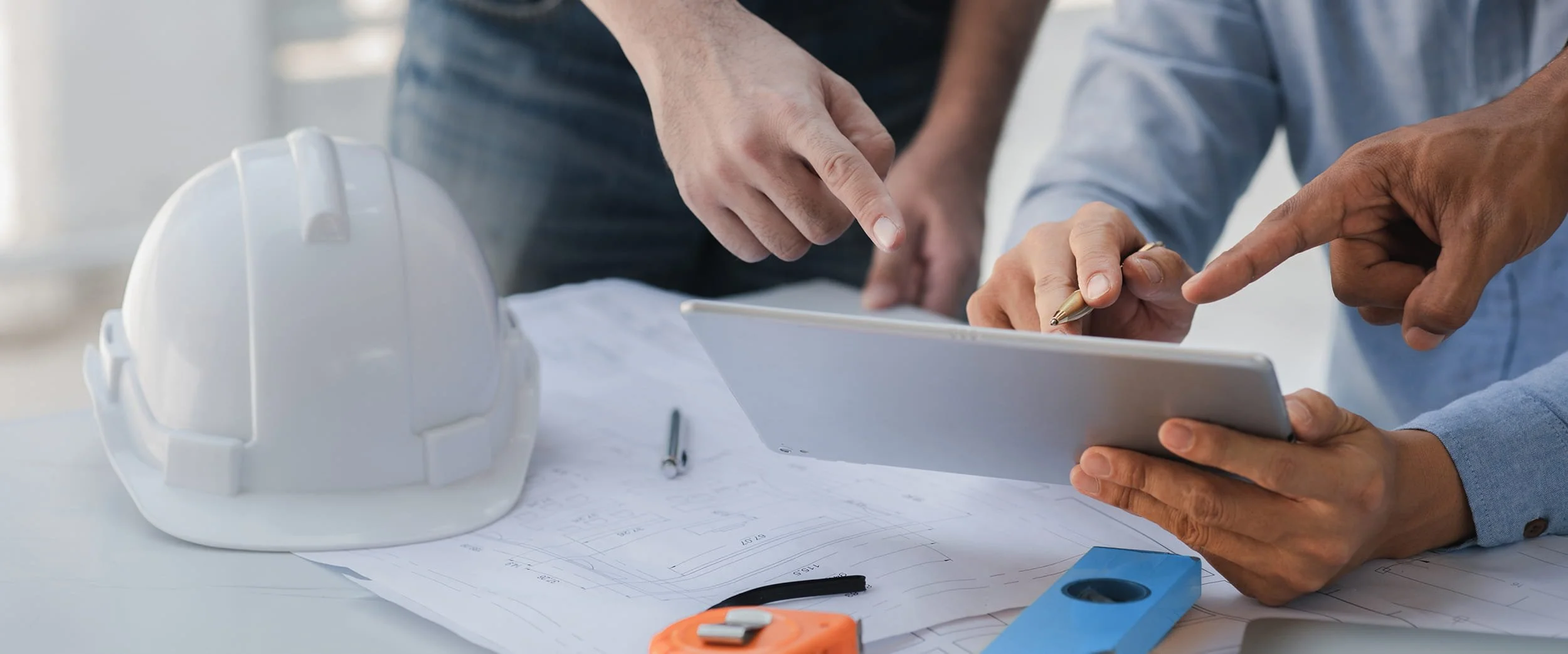 Engineers reviewing civil infrastructure plans