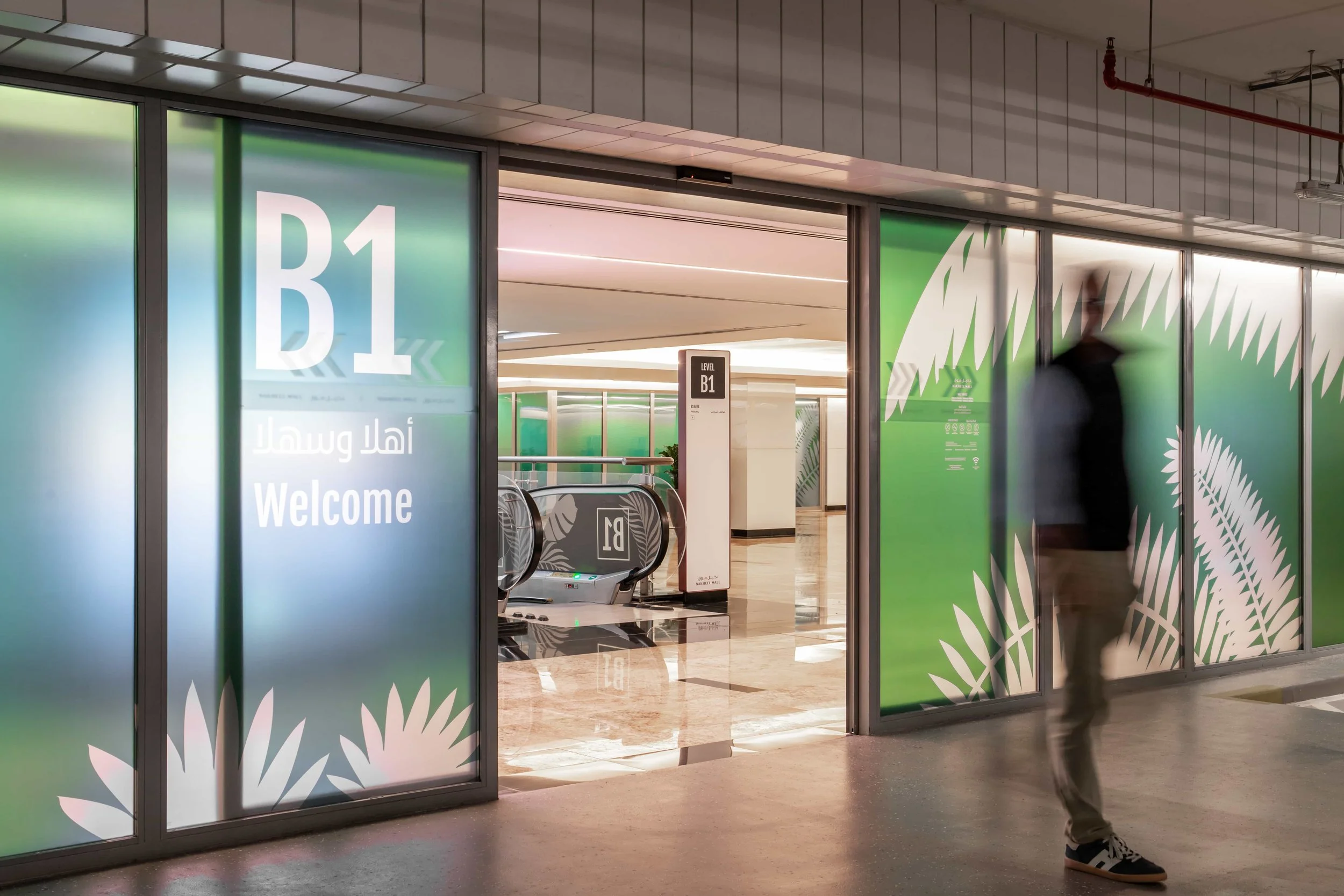 nahkeel-mall-wayfinding-lift-graphics-creative-dialog.jpg
