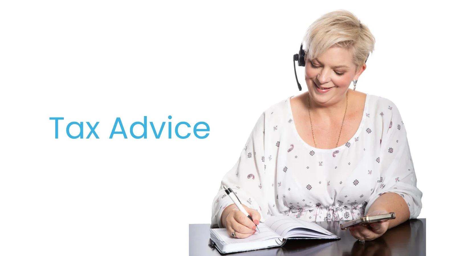 A woman with short blonde hair wearing a white blouse with small patterns, sitting at a desk with a pen in one hand and a smartphone in the other, smiling, with text that says 'Tax Advice'.