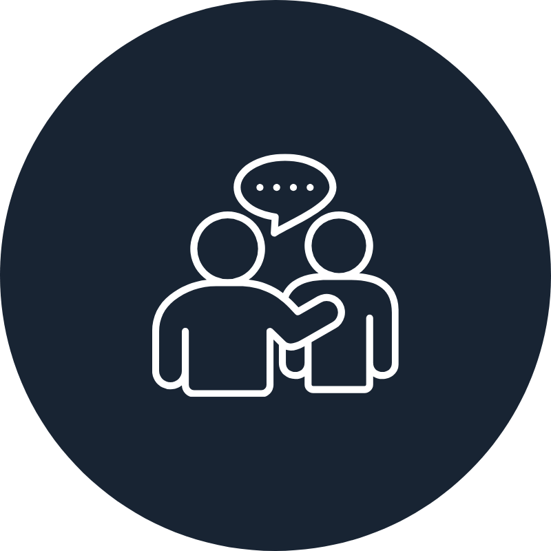 Two people talking with a speech bubble above them, indicating conversation or communication.