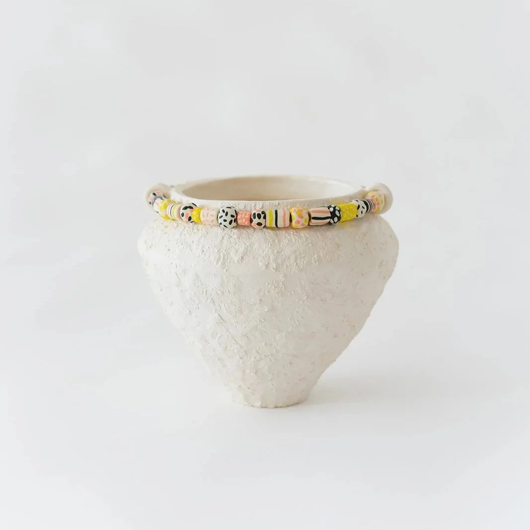 Fusion handmade white ceramic vase with grainy texture and colorful sculpted clay accents