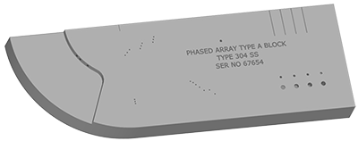 En referanseblokk for PAUT med teksten 'PHASED ARRAY TYPE A BLOCK' og materialbetegnelsen 304 SS' samt serienummer.