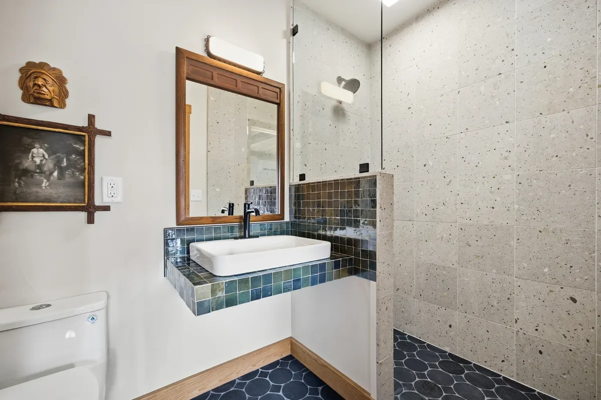 hey-house-room-1-bathroom-vessel-sink-tiled-shower-1200w.webp