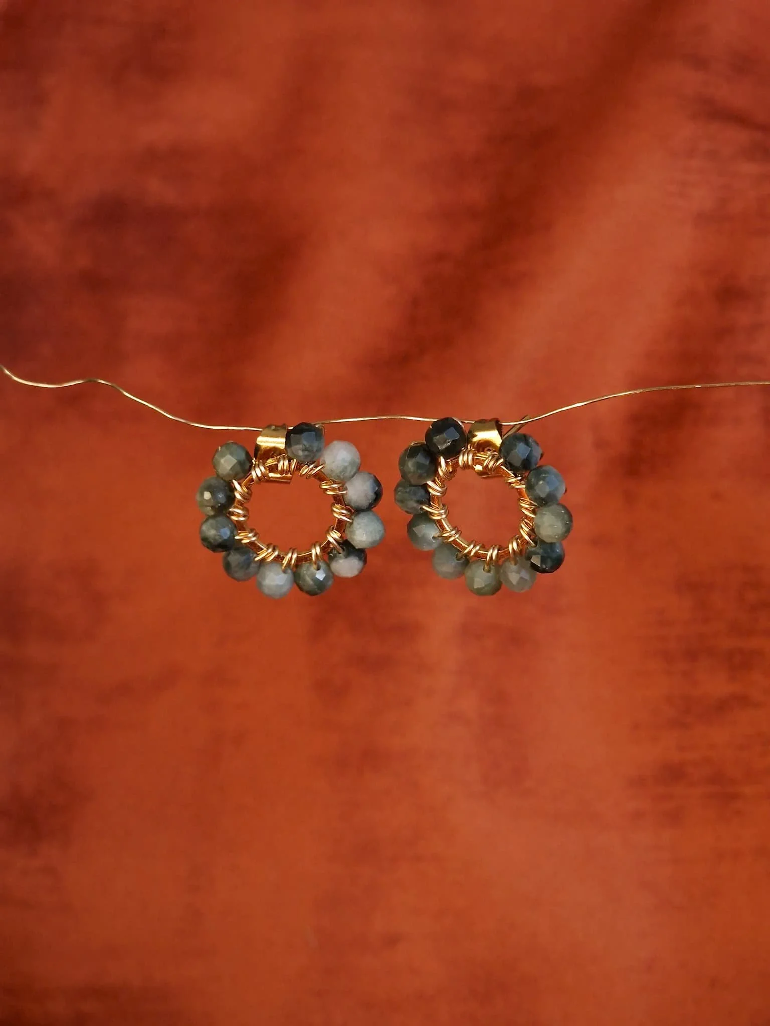 Boucles Bloom Oeil de faucon.jpg