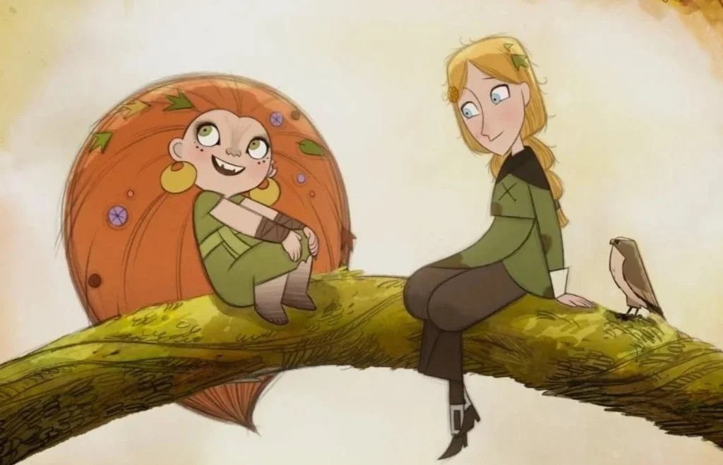 A film Still from the animated family film Wolfwalkers (2020) featuring Honor Kneafsey and Eva Whittaker. Two young girls are sitting on a tree branch one has wild ginger hair and the other is blonde.
