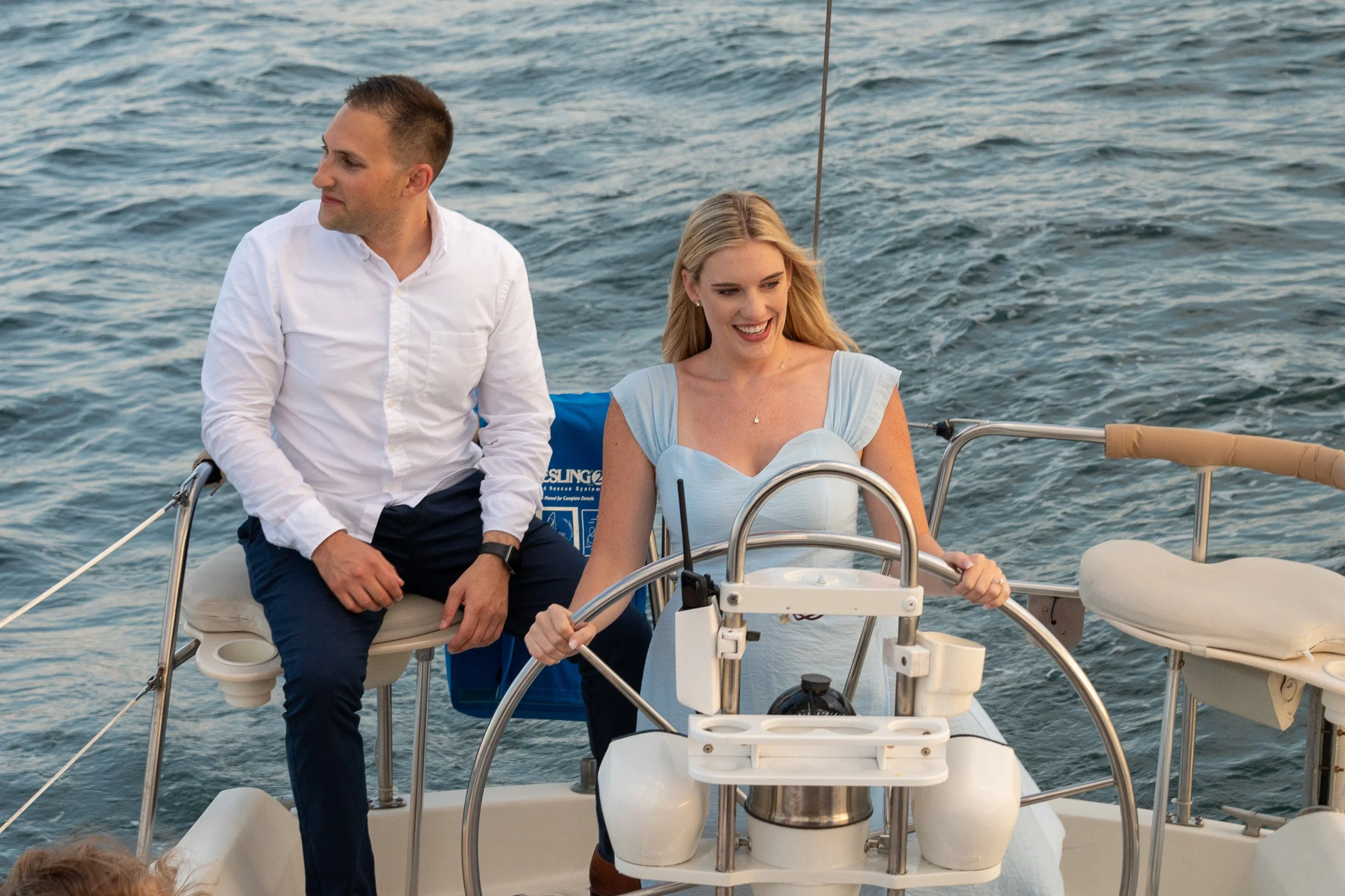 Aboard Starlight sailboat cruise, Newport Harbor, suprisse proposal, engagement session