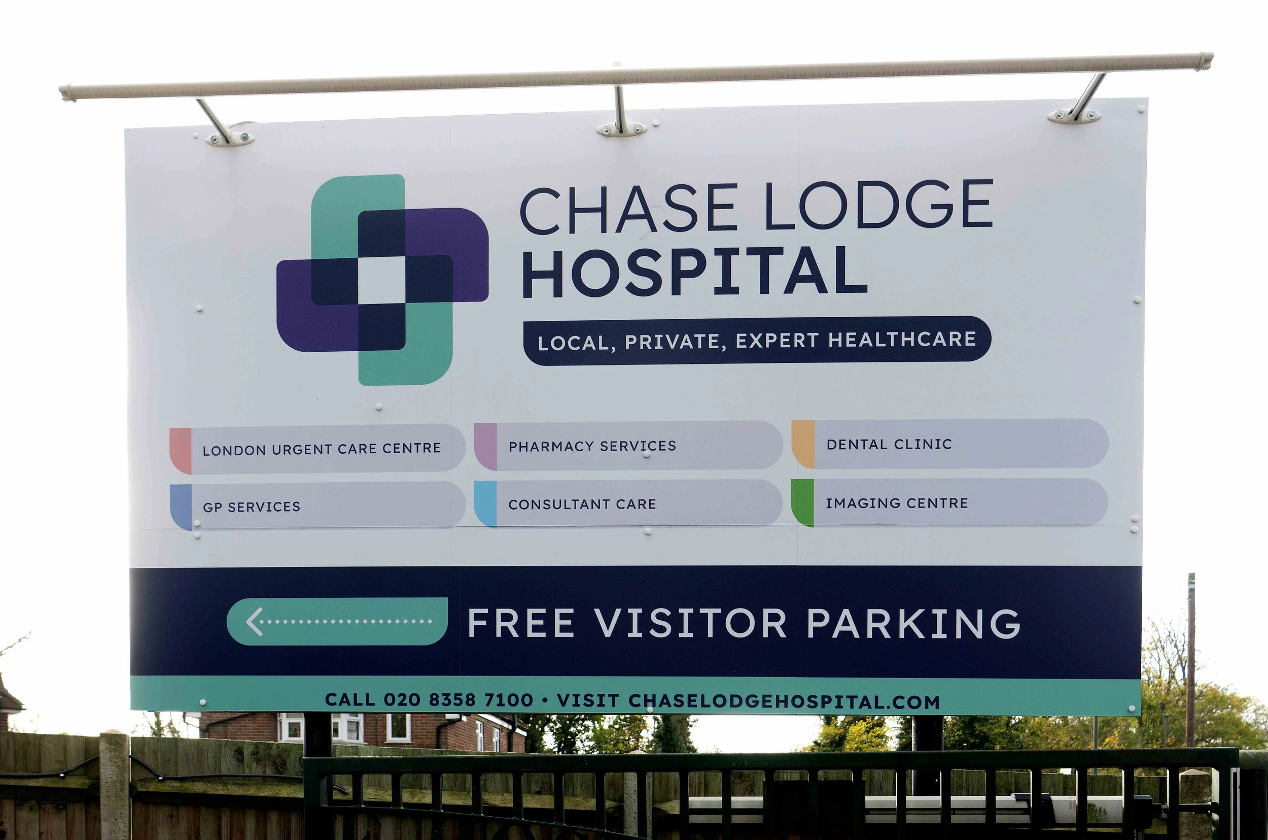 Chase Lodge Hospital entrance sign displaying the hospital name and information in Mill Hill, North London
