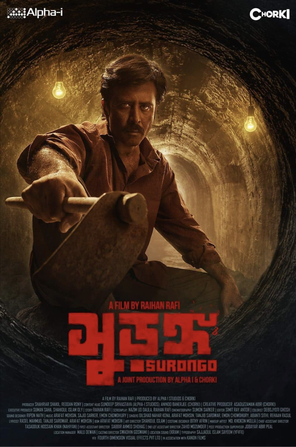 Poster for the film 'Surango' directed by Raihan Rafi, featuring a man inside a dark tunnel holding a sword, with hanging light bulbs and red text in the foreground.