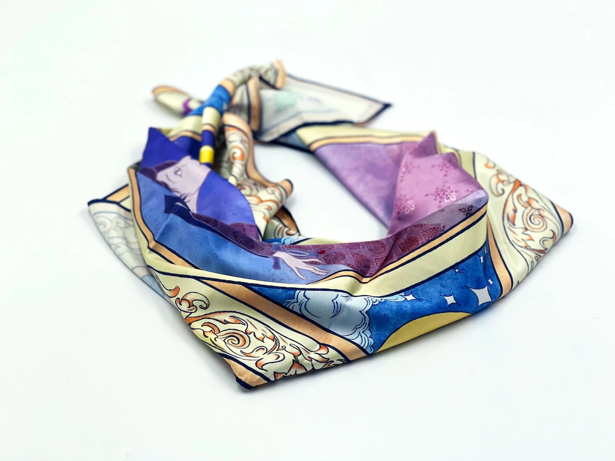 Silk scarf printed with the illustration, extending the artwork into a wearable format.