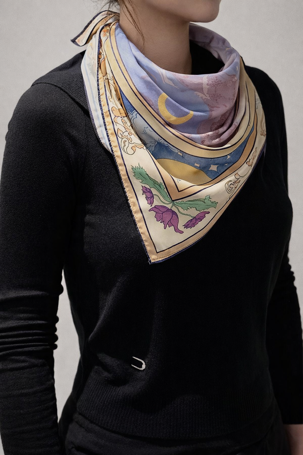 The scarf styled on model.
