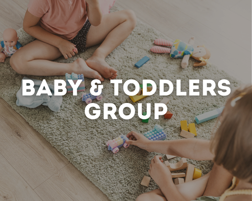 Two children playing on a carpeted floor with toys, with the text 'Baby & Toddlers Group' overlaid.