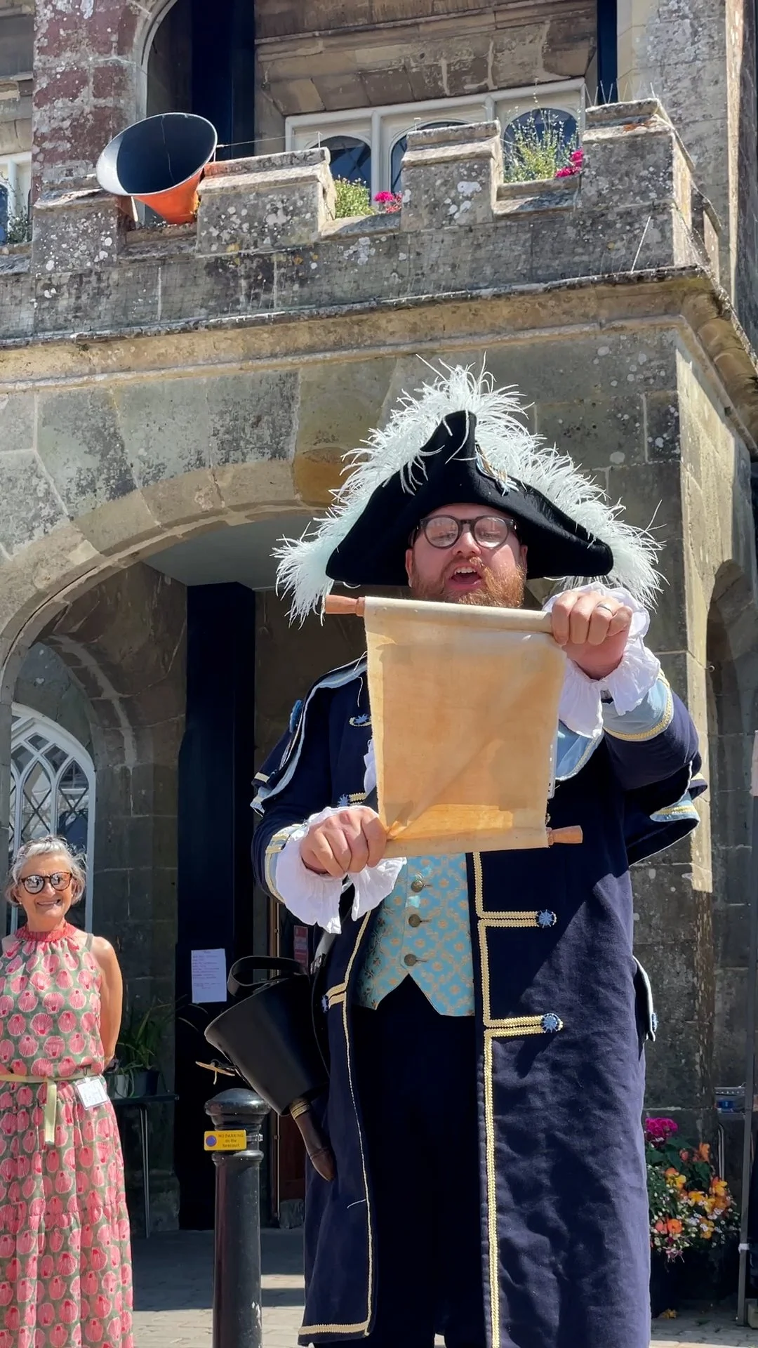 Shaftesbury's Town Cryer reading the Common manifesto at the opening event, with Not A Cuckoo Clock installation behind.