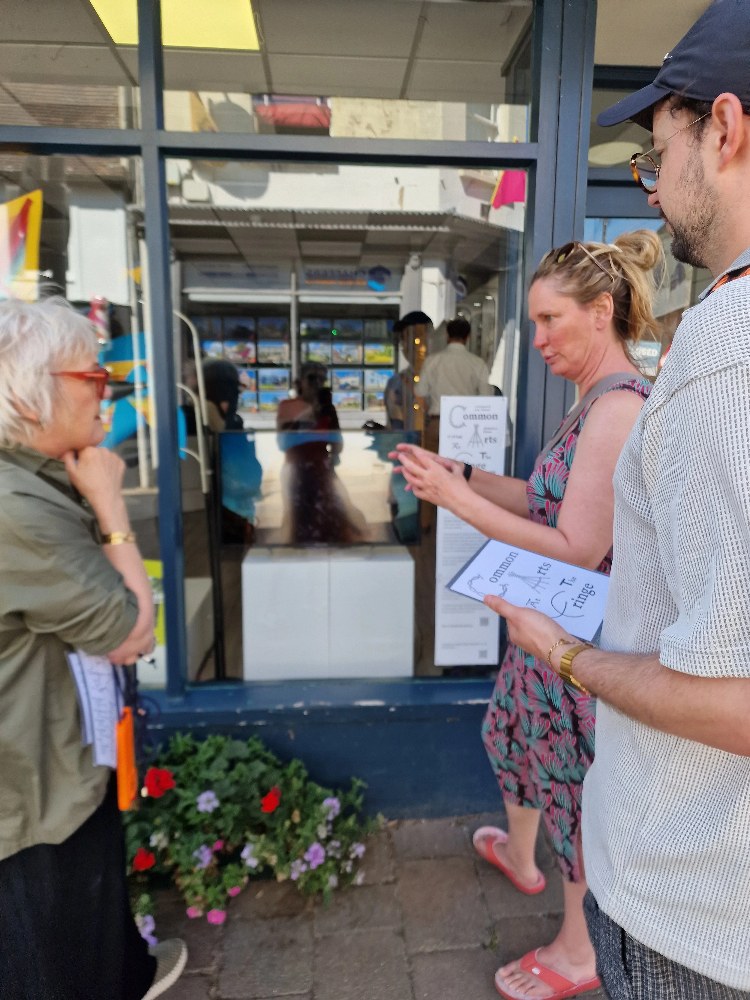 Lizzie Sykes’ talking about her video work Tiago’s Sequence in Harrold Opticians window.