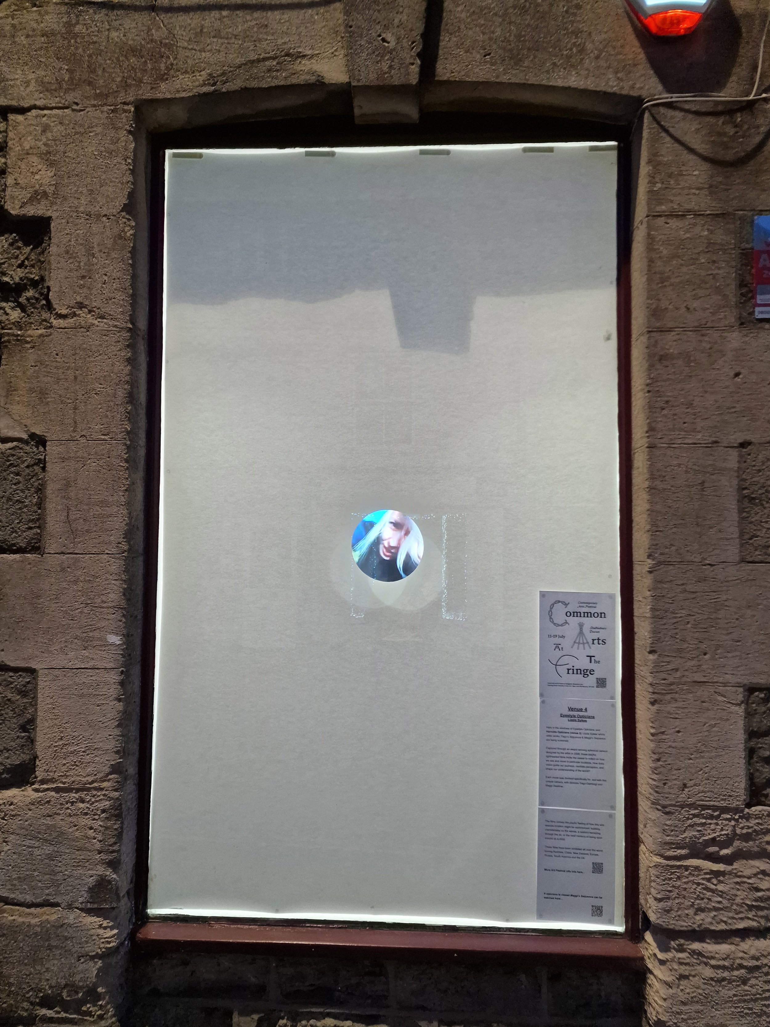 Lizzie Sykes’ video work Maggi’s Sequence in Eyestyle Opticians window.