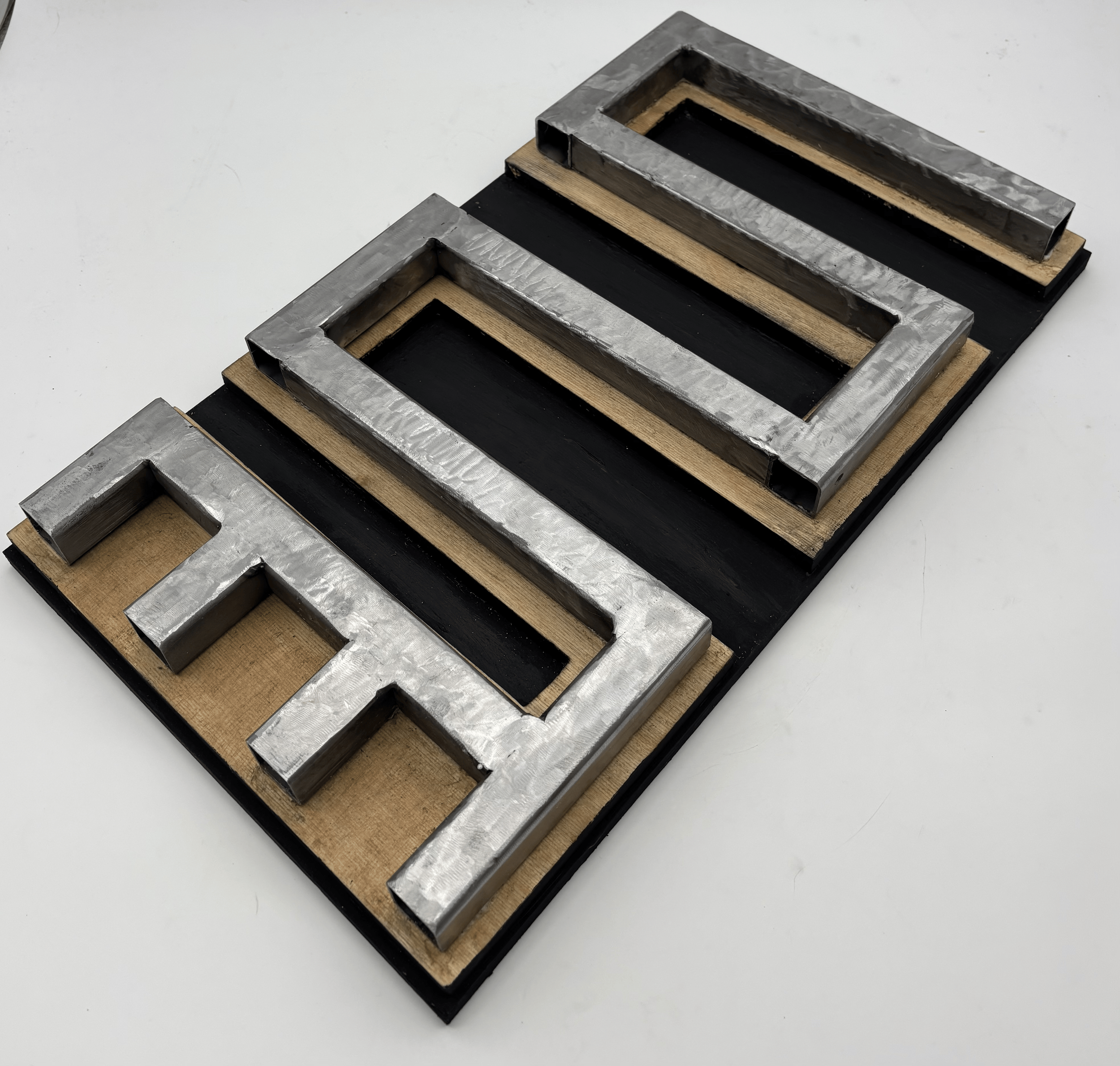 Nkyinkyim, 2025. steel beam and wood. 