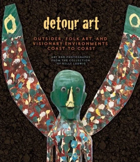 Book cover titled 'detour art' featuring a colorful abstract sculpture with outstretched arms and a green face against a dark textured background.