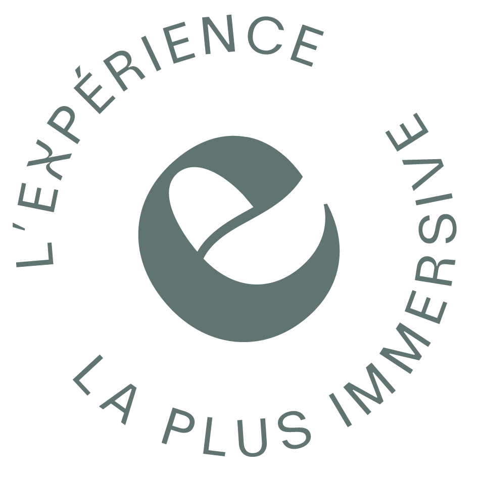 Logo circulaire avec un 'e' stylisé au centre, entouré du texte 'L'EXPÉRIENCE, LA PLUS IMMERSIVE