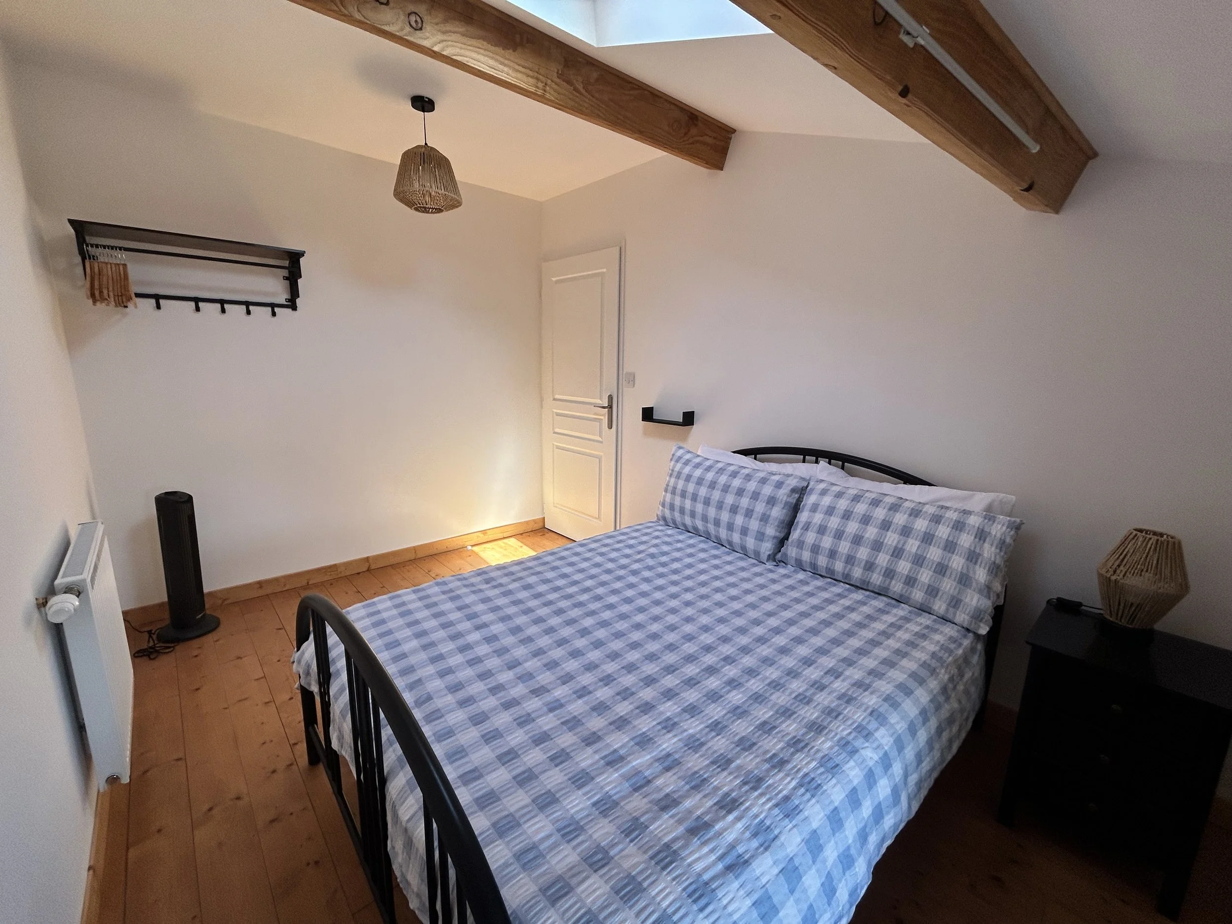 Bedroom three double bed and hanging shelf.jpeg