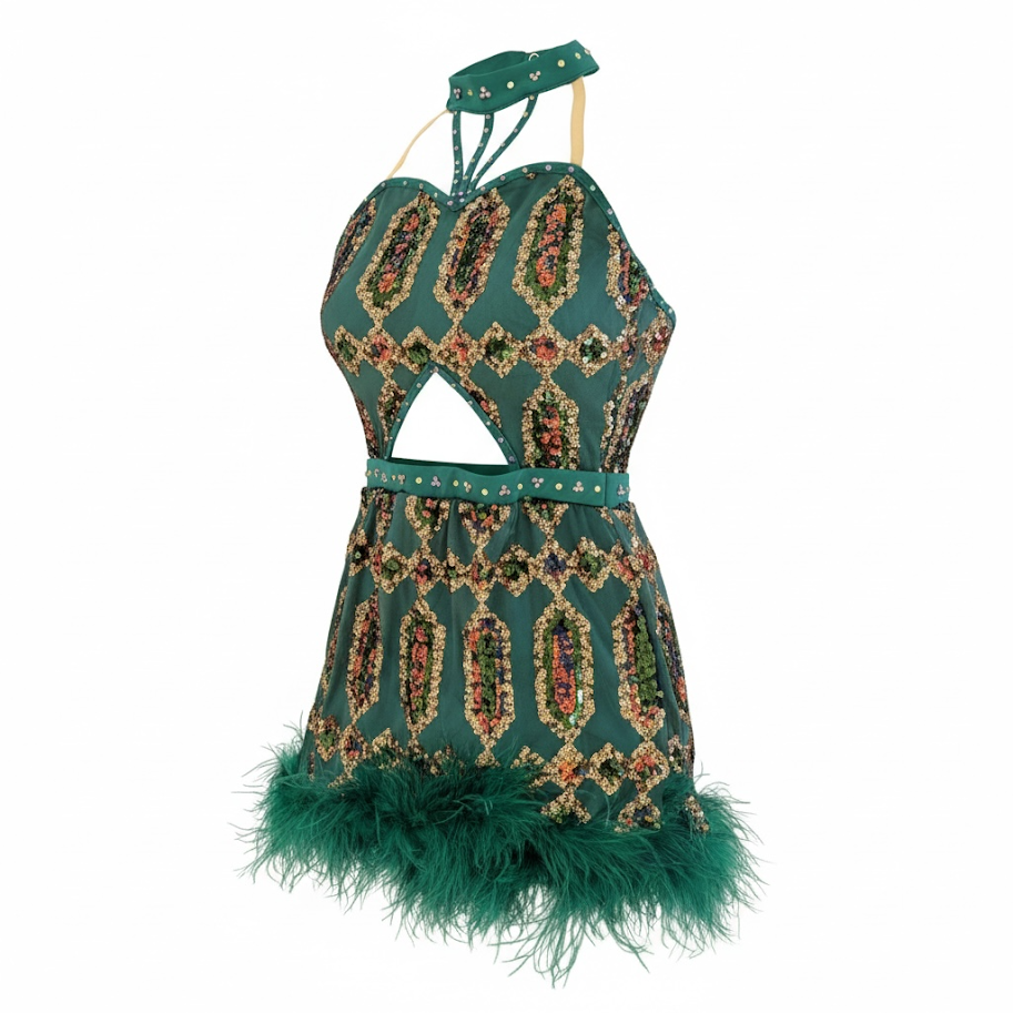 A colorful, embellished dress with a floral pattern, cutouts at the waist and a feathered hemline, against a plain white background.