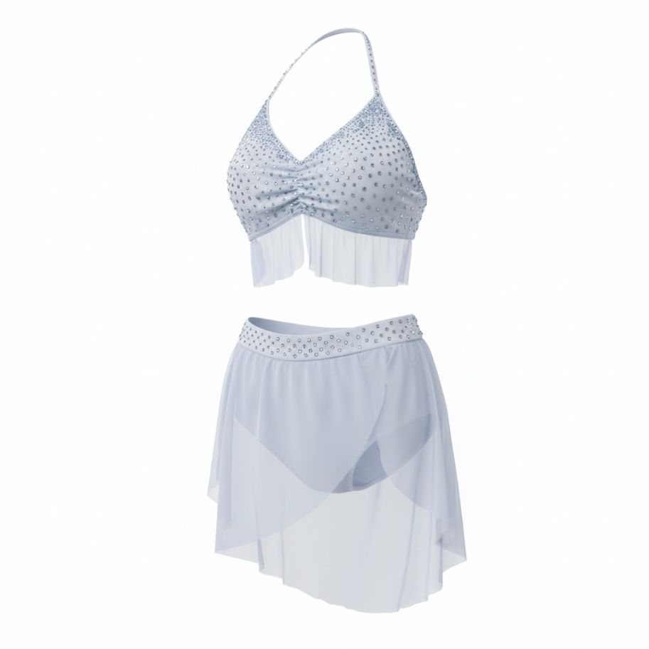 White two-piece swimsuit with rhinestone embellishments, featuring a ruched top with a halter strap and a flowy skirted bottom with a matching rhinestone waistband.