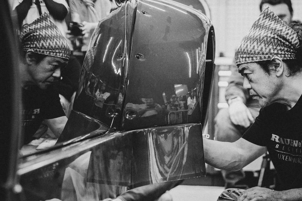 Akira Nakai focusing intently on working on RWB build.