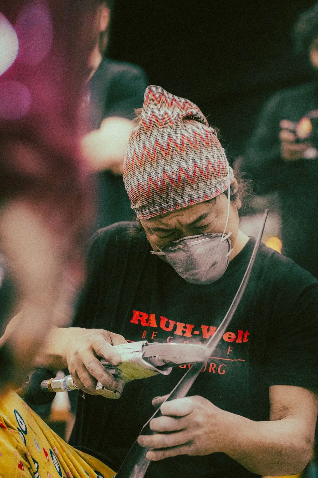 Akira Nakai working on pink Porsche RWB.