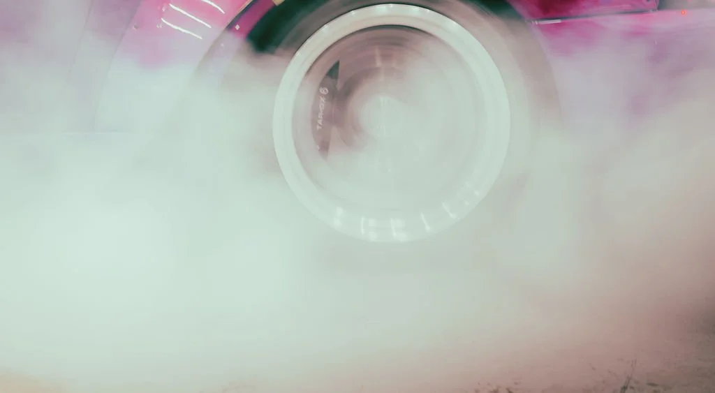 Close-up of a car tyre burnout.