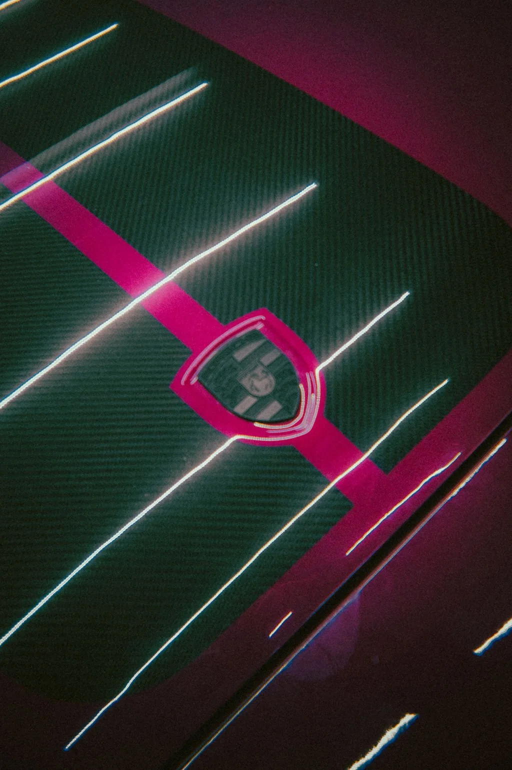 An overhead view of pink Porsche RWB - Rubi.