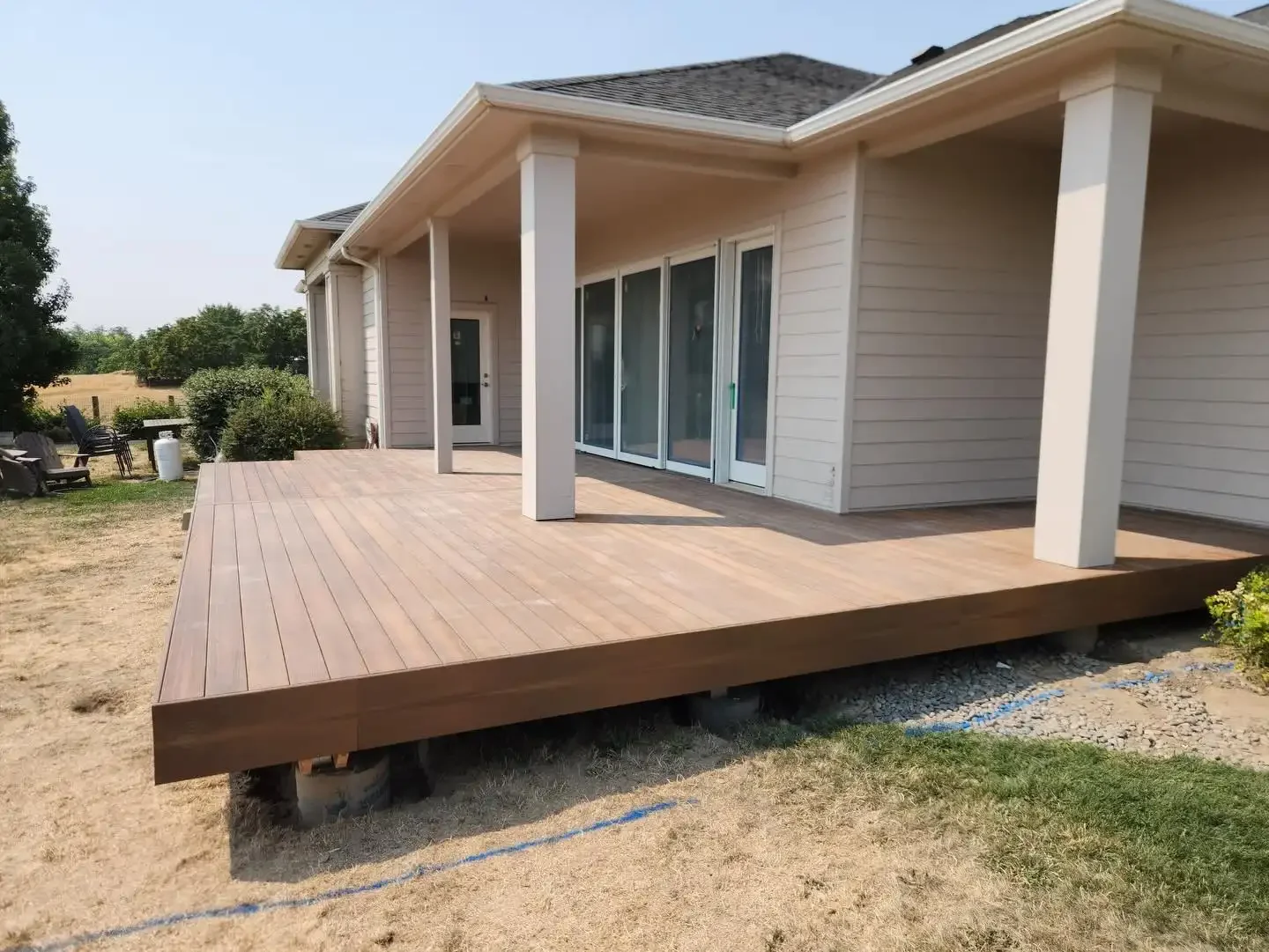 New covered composite deck built by Jepsen Construction