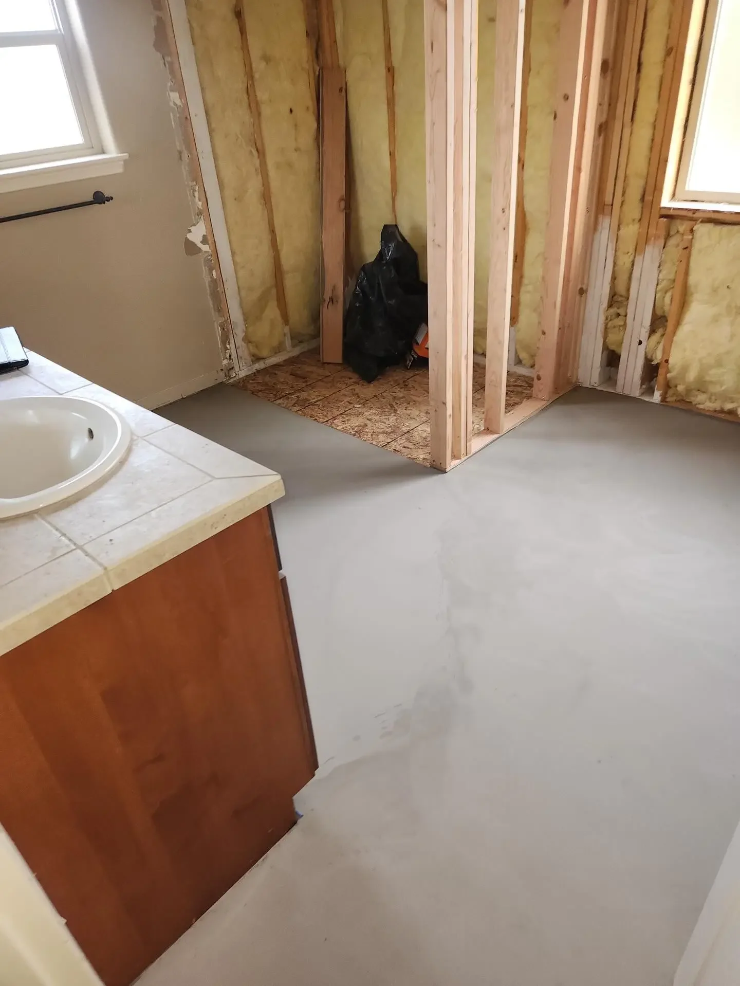 Bathroom renovation in progress before the walk-in shower installation