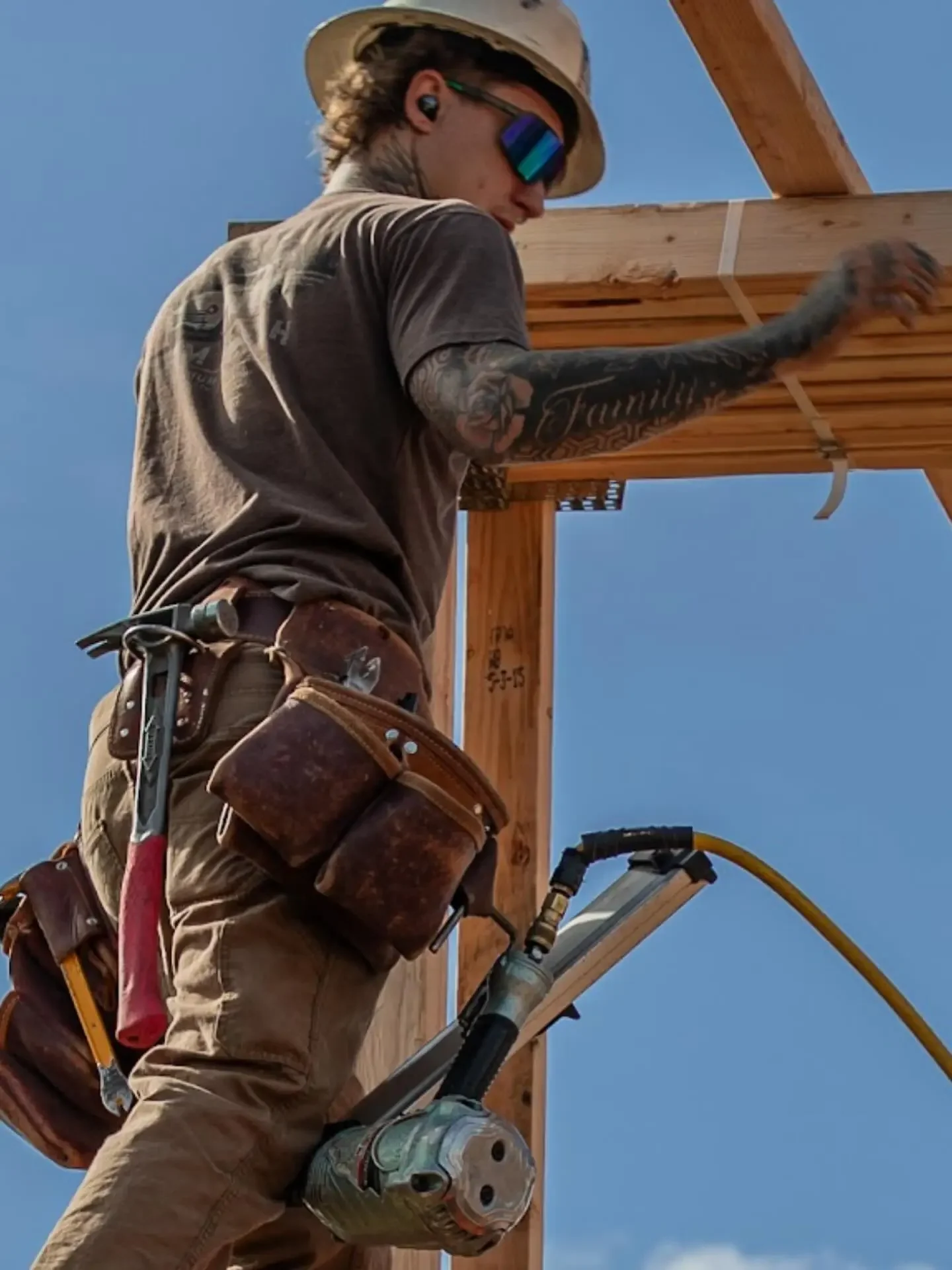 David Jepsen, owner of Jepsen Construction, working on a wood framing project