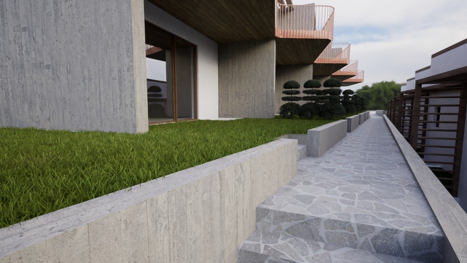 modern maisonette walkway with landscaped garden and private access paths in Kallikrateia Greece. Stone pathway with landscaped greenery providing private access to maisonettes in Kallikrateia