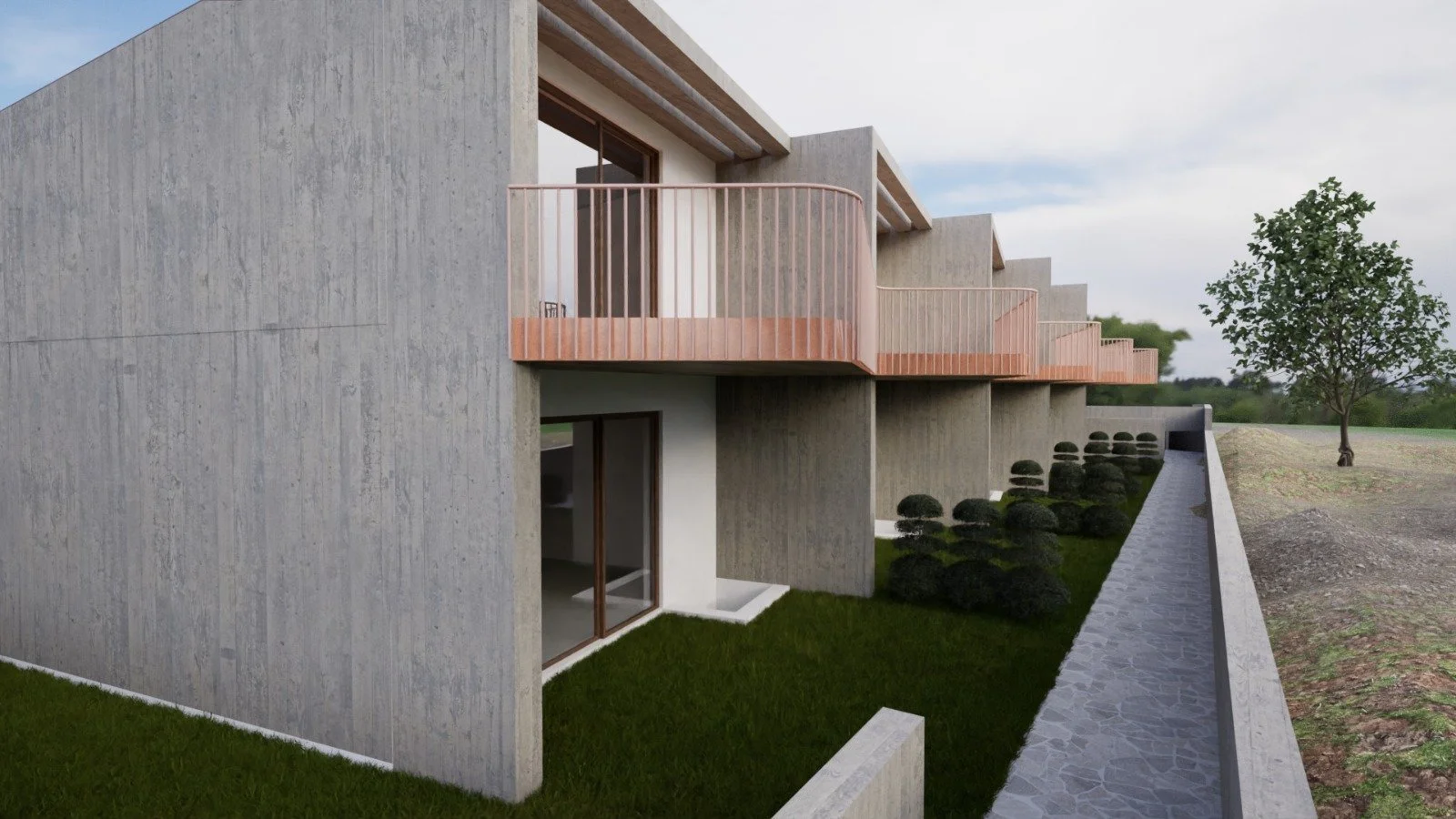 Modern residential building with concrete walls, wooden balconies, and landscaped yard with grass and small bushes, situated on a sloped terrain