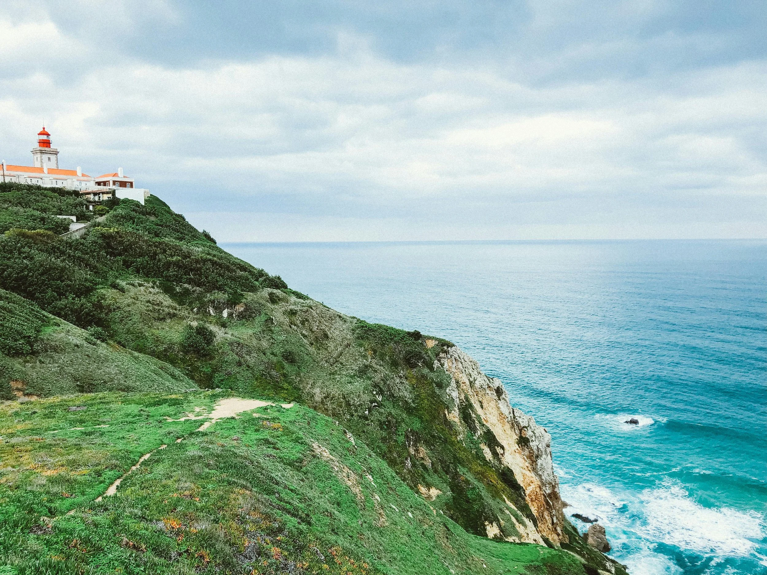 Cabo da Roca (Cape Roca) in Portugal is the westernmost point of continental Europe. Located at 38°46'N 9°30'W within the Sintra-Cascais Natural Park, it features a 140-meter-high cliff, a lighthouse, and a monument.