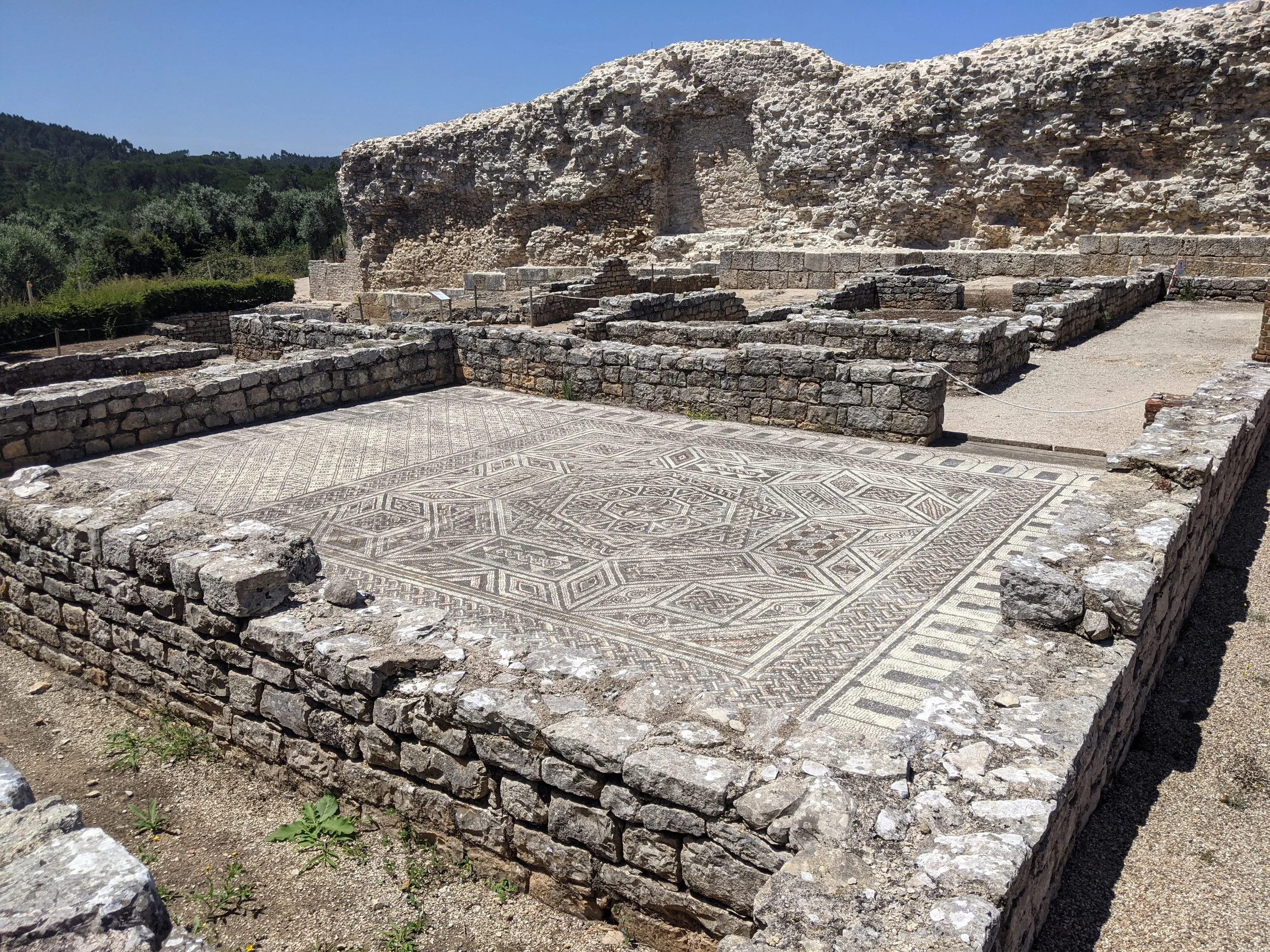 Roman ruins with walls and mosaic tiles in Conimbriga Portugal